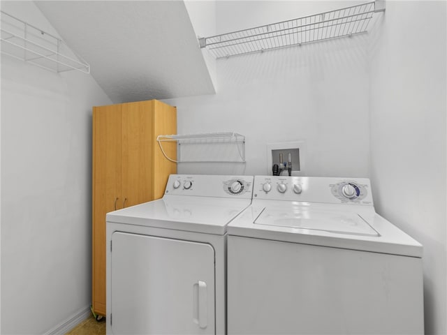 laundry room with washer and dryer