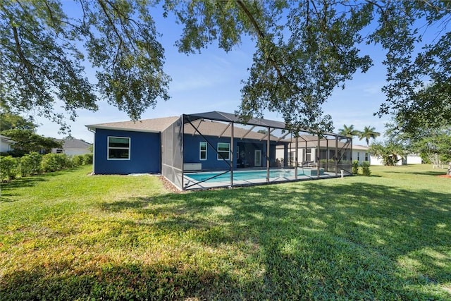 3612 2nd St SW, Vero Beach, FL 32968 - back of property featuring a yard, an outdoor pool, and glass enclosure
