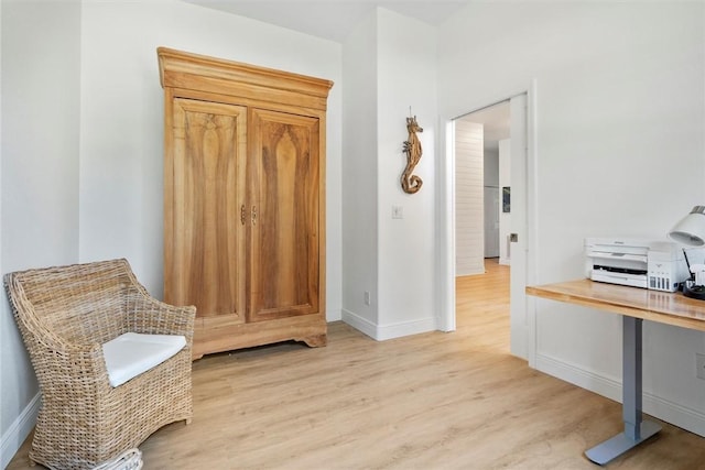 3612 2nd St SW, Vero Beach, FL 32968 - sitting room with light wood-style floors and baseboards