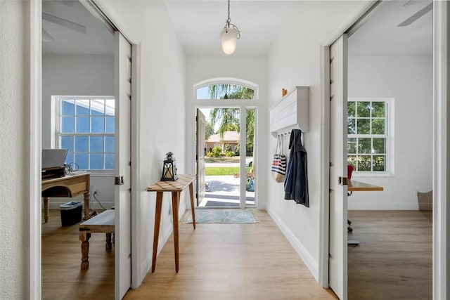 3612 2nd St SW, Vero Beach, FL 32968 - foyer entrance featuring light wood-type flooring and baseboards