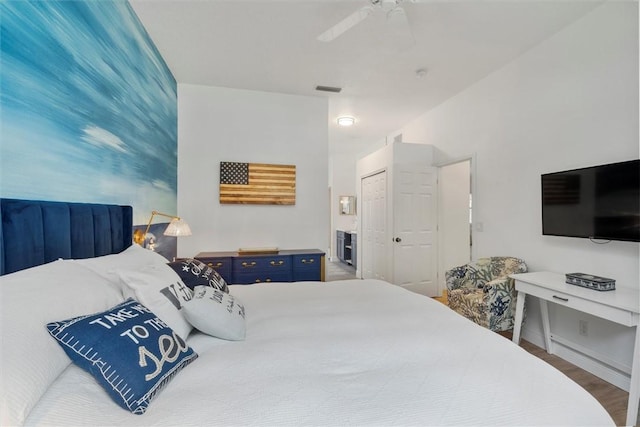 3612 2nd St SW, Vero Beach, FL 32968 - bedroom with wood finished floors, a ceiling fan, and a closet