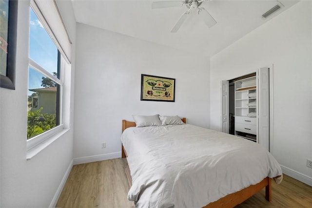3612 2nd St SW, Vero Beach, FL 32968 - bedroom featuring multiple windows, light wood finished floors, and a ceiling fan