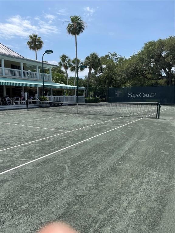 1275 Winding Oaks Cir E Unit 702, Vero Beach, FL 32963 - view of tennis court