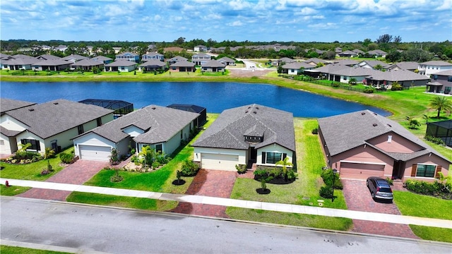 bird's eye view with a water view