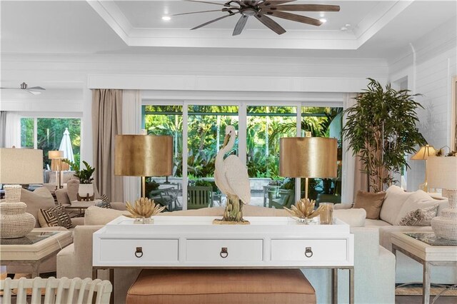202 Strand Sq, Vero Beach, FL 32963 - living area featuring ceiling fan and crown molding
