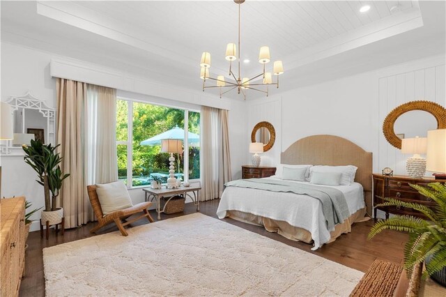 202 Strand Sq, Vero Beach, FL 32963 - bedroom with wood finished floors, a chandelier, recessed lighting, and wooden ceiling
