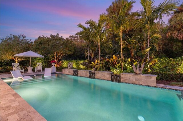 202 Strand Sq, Vero Beach, FL 32963 - view of pool at dusk