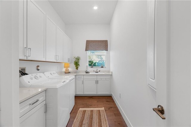 202 Strand Sq, Vero Beach, FL 32963 - clothes washing area with cabinet space, independent washer and dryer, dark wood-type flooring, baseboards, and recessed lighting