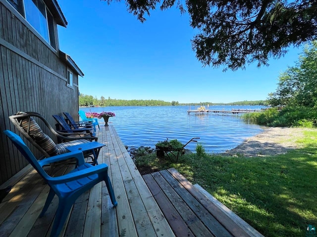 exterior space with a water view