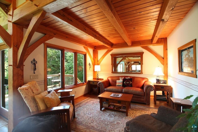 living room with beamed ceiling, wooden ceiling, plenty of natural light, and hardwood / wood-style floors