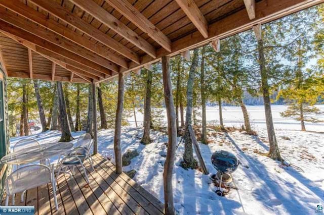 view of snow covered deck