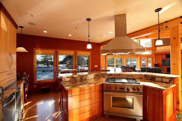 kitchen with light stone counters, hanging light fixtures, designer stove, and extractor fan