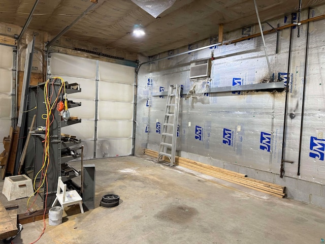 garage with a wall mounted AC