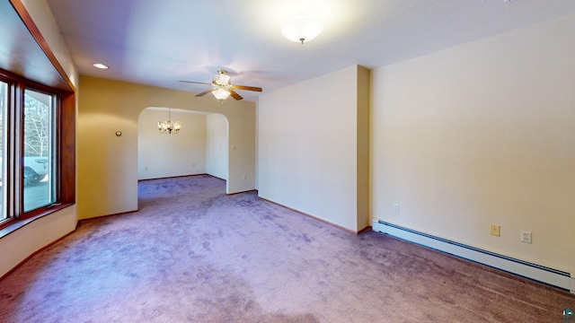 spare room with light carpet, ceiling fan with notable chandelier, and a baseboard heating unit