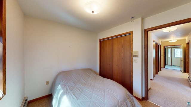 carpeted bedroom featuring a closet