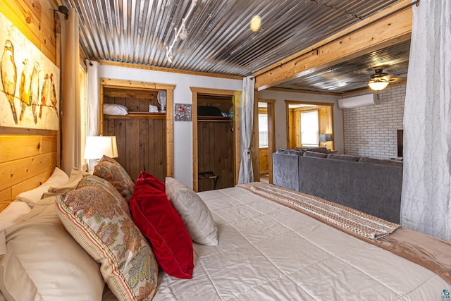 bedroom with a wall mounted air conditioner