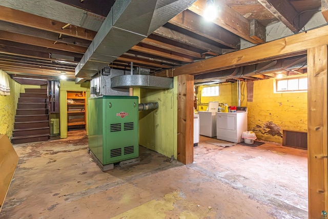 basement featuring washing machine and dryer