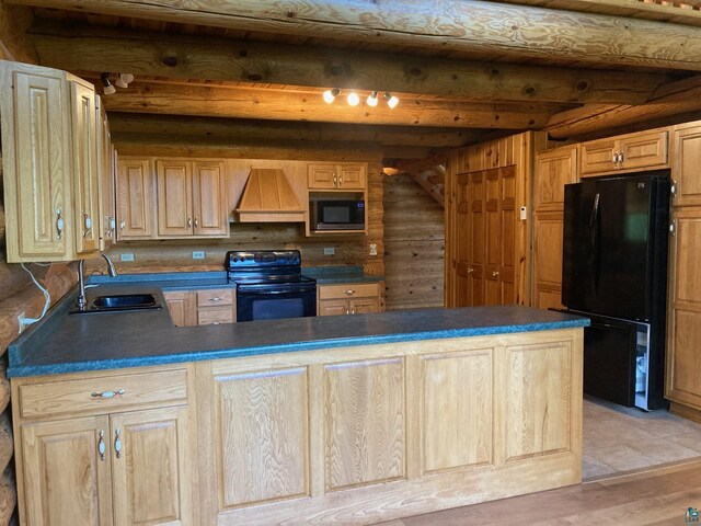 kitchen featuring kitchen peninsula, rustic walls, custom exhaust hood, sink, and black appliances