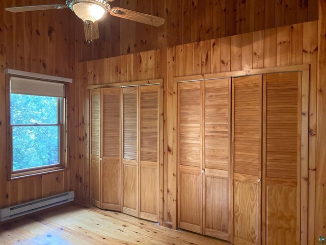 closet with a baseboard radiator