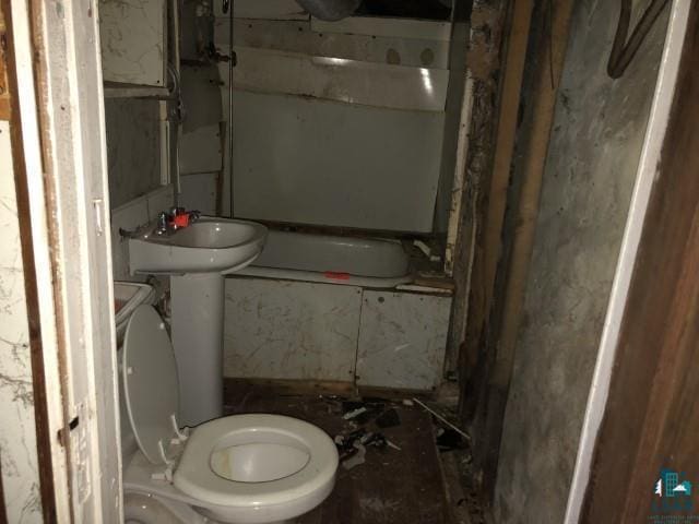 bathroom with toilet and sink