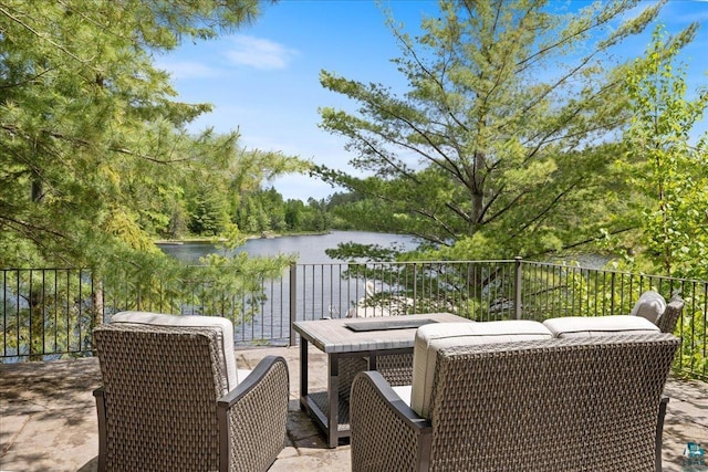 view of patio / terrace with a water view