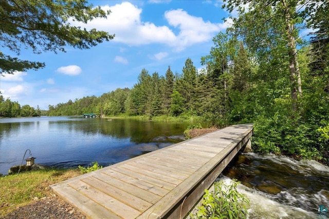 view of dock with a water view