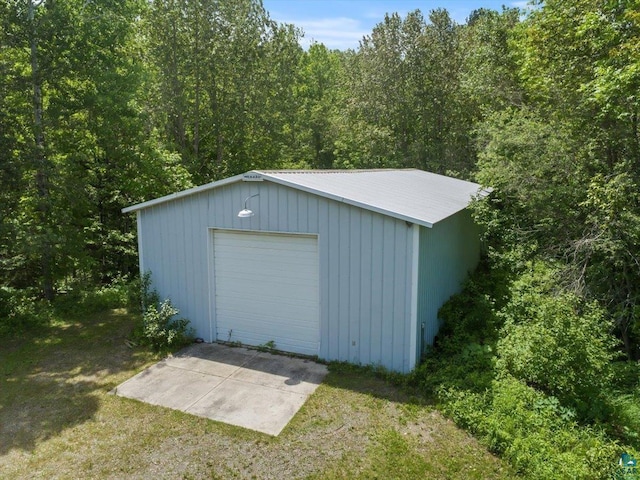 garage with a lawn