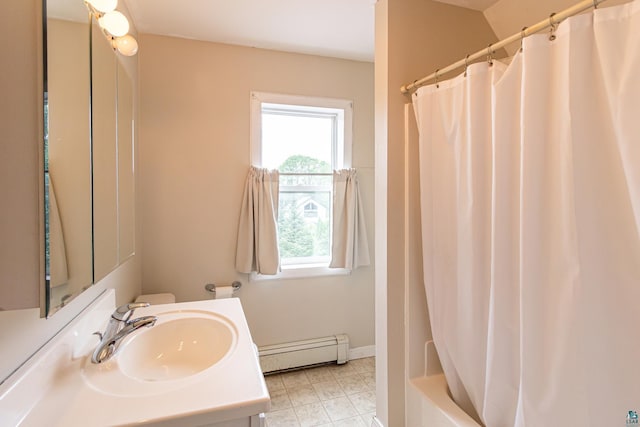 bathroom featuring vanity and a baseboard radiator