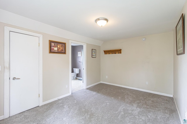 unfurnished room featuring carpet flooring