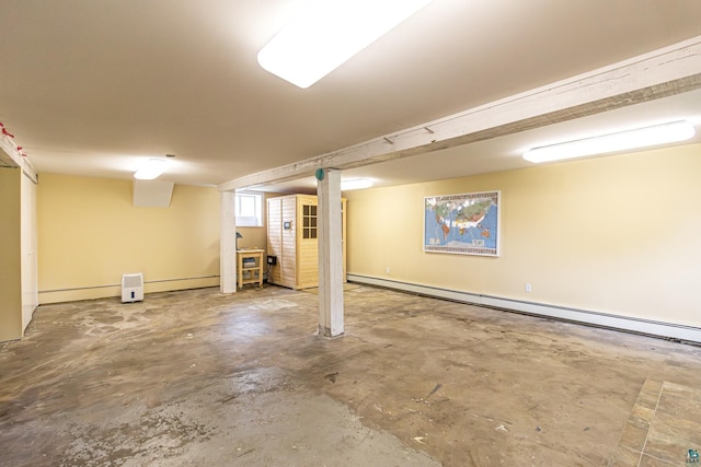 basement featuring a baseboard radiator