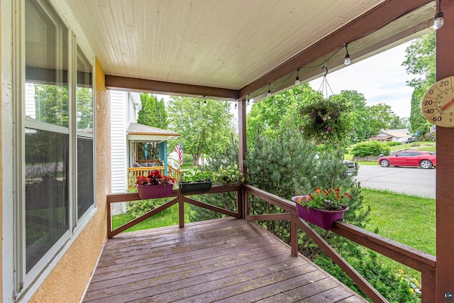 deck with covered porch