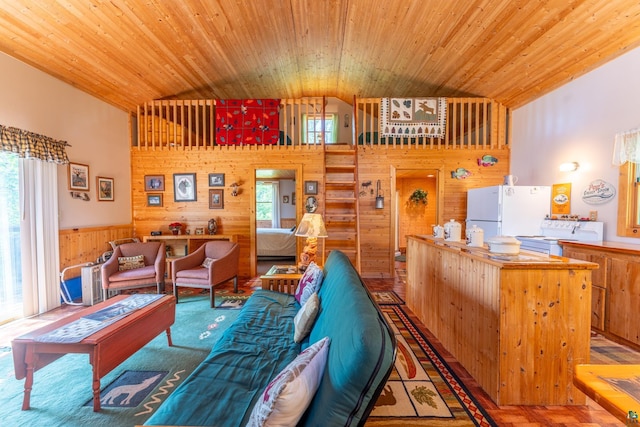 living room with a healthy amount of sunlight, wood ceiling, and high vaulted ceiling