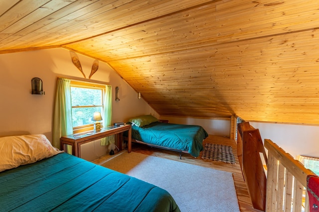 bedroom with hardwood / wood-style flooring, wooden ceiling, and lofted ceiling