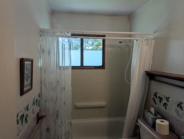 bathroom featuring toilet and shower / bath combo with shower curtain