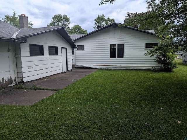 exterior space with a lawn