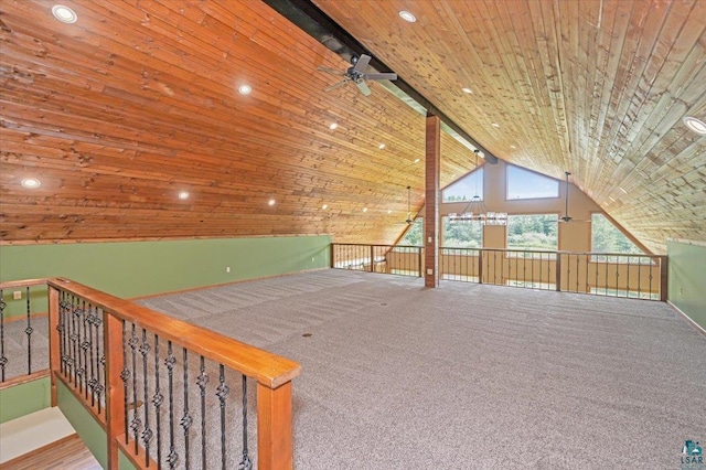 additional living space with carpet flooring, ceiling fan, vaulted ceiling, and wood ceiling