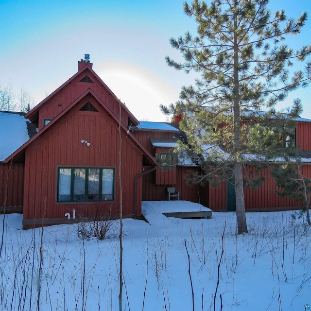 view of snow covered property