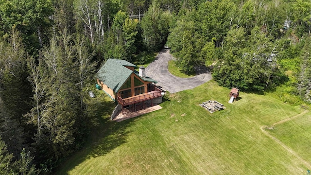 aerial view featuring a view of trees