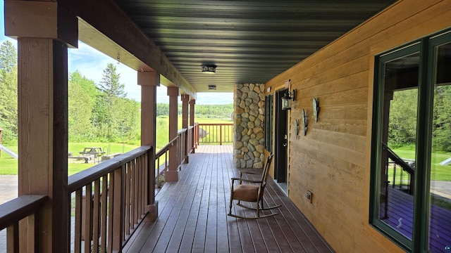 wooden terrace with covered porch