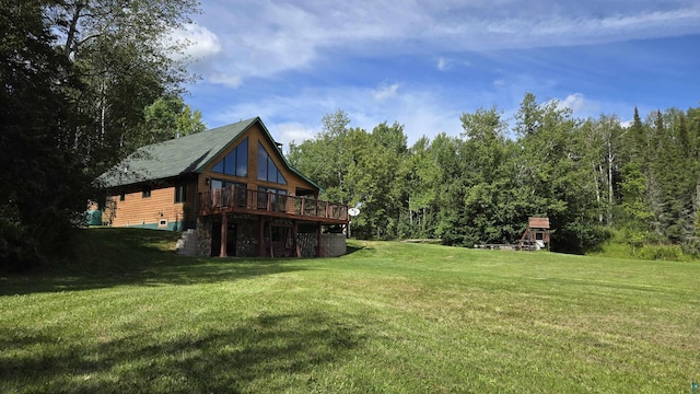 view of yard featuring a deck