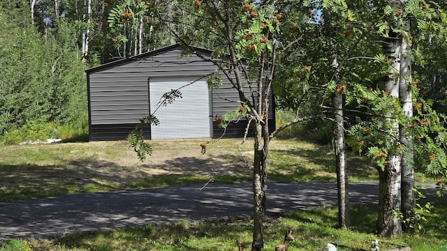 view of outbuilding with an outbuilding