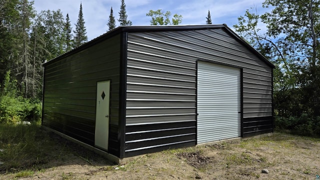 view of outbuilding with an outbuilding