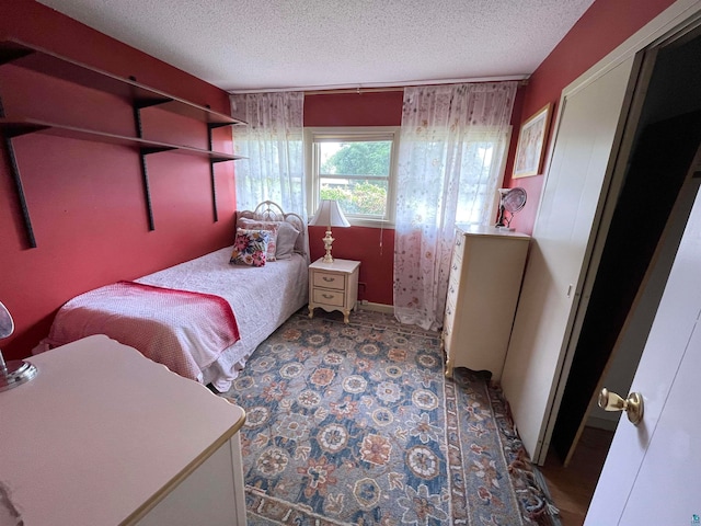 bedroom with a textured ceiling