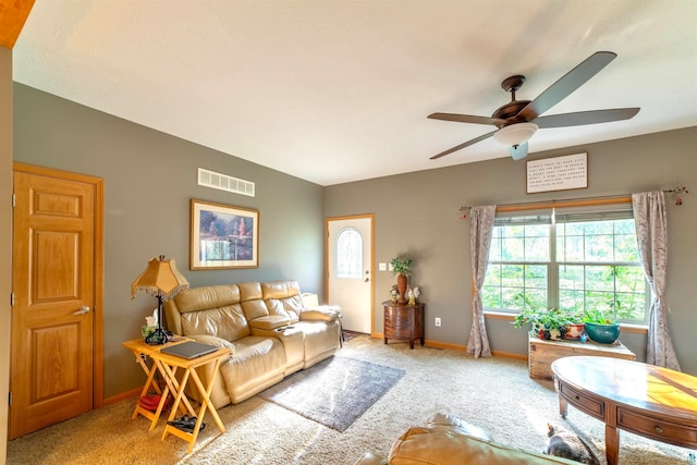 living room with ceiling fan and light colored carpet