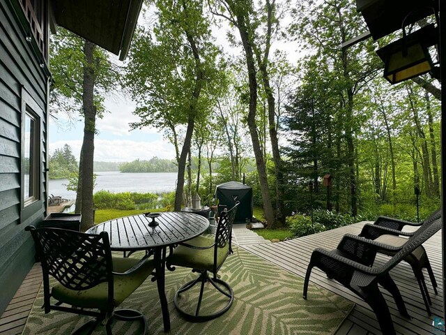 deck featuring a water view