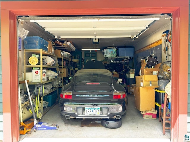 garage featuring a garage door opener