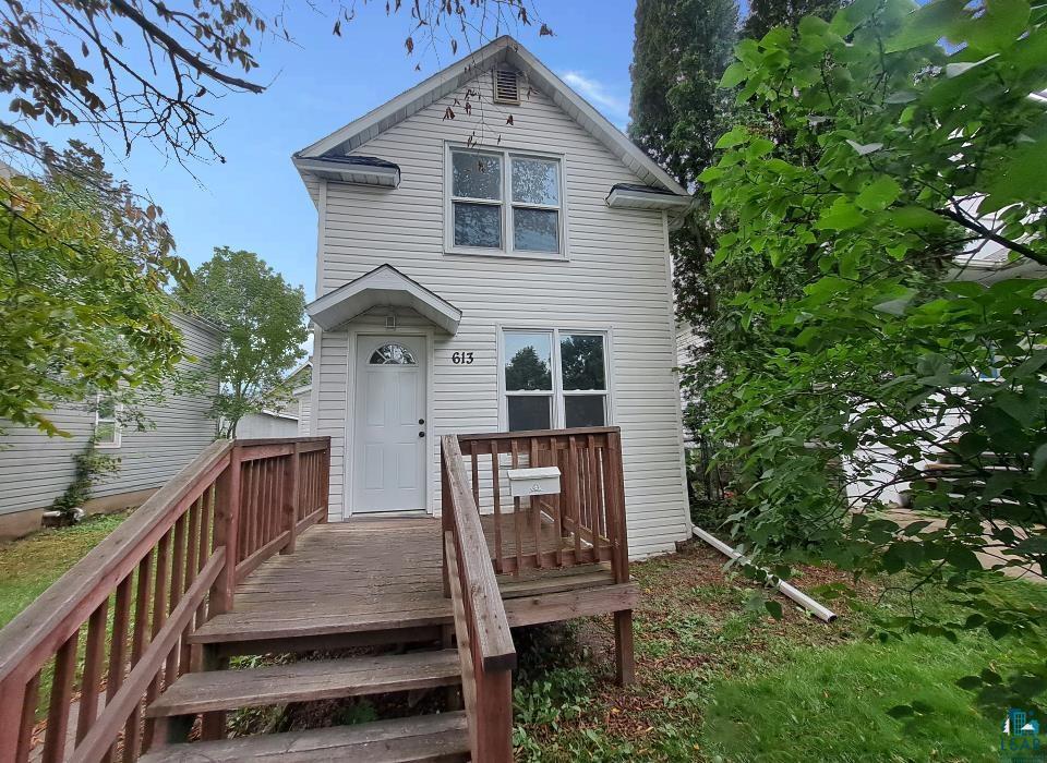 view of front of property with a deck