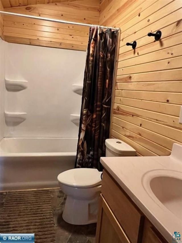 full bathroom with toilet, wood walls, shower / tub combo with curtain, and vanity