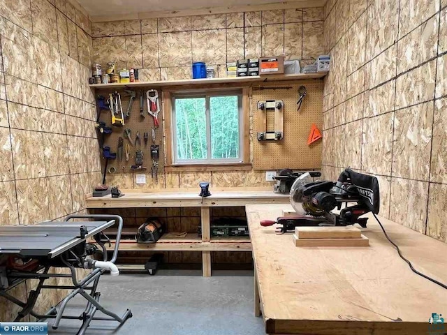 interior space with concrete flooring and open shelves