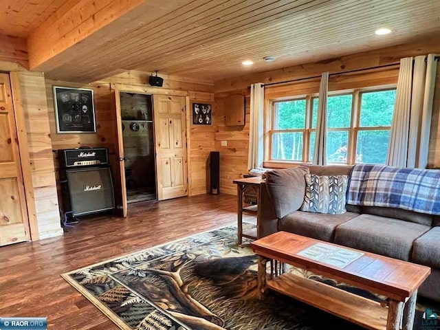 living area featuring wooden ceiling, wooden walls, and wood finished floors